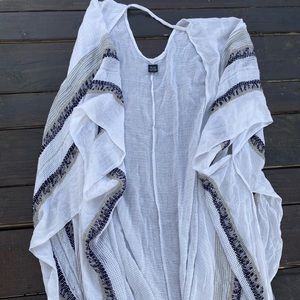 White woven shawl with black and silver details